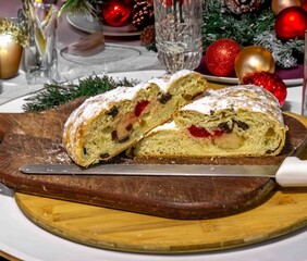 Traditional German Christmas Stollen Slices with Marzipan and Dried Fruits