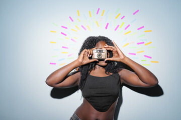 Portrait of a young woman with a retro camera at the center. Arrows in the background point towards the woman. social media, successful, communication concept.