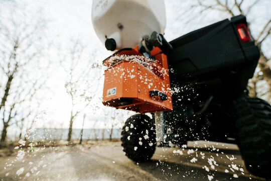 Close-Up of Salt Spreader in Operation