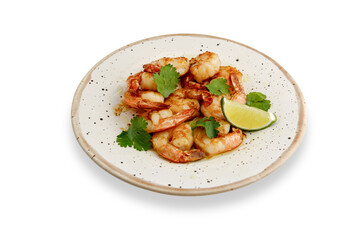 Deliciously cooked shrimp served with lime and cilantro on a rustic plate. isolated. the concept of expensive and exquisite dishes for restaurants and cafes