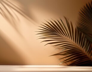 minimalistic abstract summer background with blurred shadows of palm leaves on beige tan wall for product presentation