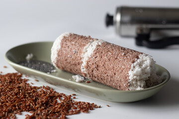Navara rice puttu or steamed rice cake, made with grated coconut and Navara rice grains