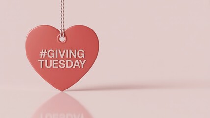 Giving Tuesday graphic featuring a large, suspended coral heart on a soft pink background, symbolizing charity, love, and compassion for donations.