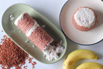 Navara rice puttu, cylindrical and dome shaped steamed rice cake with Navara rice grains