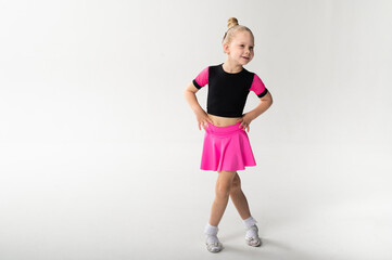 Girl with cochlear implant in dance pose, copy space. Symbol of resilience, equality, and artistic...
