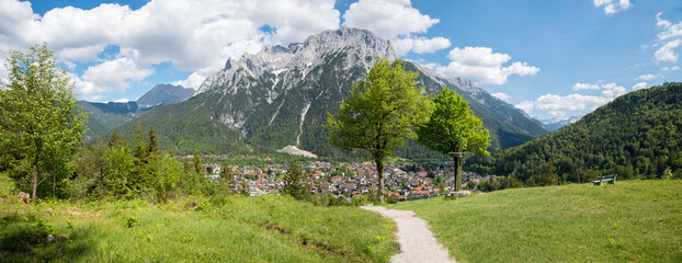recreational place above Mittenwald, with bench and pilgrimage cross. Karwendel mountains.
