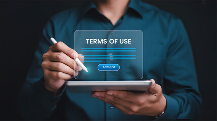 Hand Using Stylus to Accept Terms of Use on Digital Interface Legal Agreement and Consent