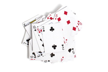 A deck of playing cards lies on a white background.