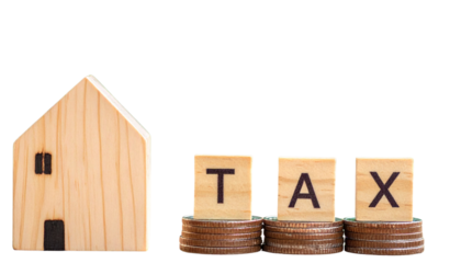 Real Estate Tax Concept with Coin Piles and Wooden Home Icon Beside TAX Blocks, Isolated