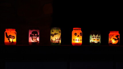 Glowing jack o' lanterns are beautifully lit. Ideal for Halloween party decorations © rikajiMiAda