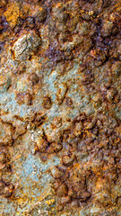 rusting old metal plate painted with blue paint