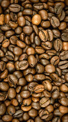 roasted coffee beans macro photo. background or texture