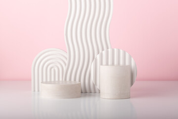 Cosmetics product presentation scene made with gypsum props on pink background. Petfect for product placement and designs.