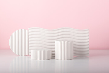 Cosmetics product presentation scene made with gypsum props on pink background. Petfect for product placement and designs.