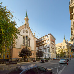 Buildings along Hold street towards two churches, Budapest, Hungary.