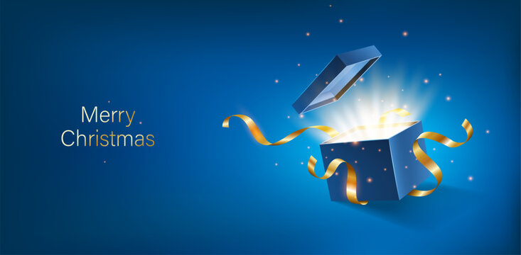 Blue opened 3d realistic gift box with magical shining glow and golden ribbons flying off cover, place for your text vector illustration