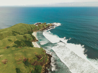 The coastal view is surrounded by enchanting green hills, including Merese Hill, which offers a spectacular viewpoint to enjoy the scenery. LOMBOK, NTB , INDONESIA
