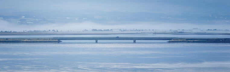 On a peaceful, Eyjafjörður Fjord sailing into Akureyri, misty start to a beautiful day, August 2025 
