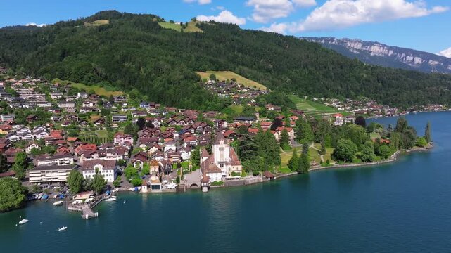 The beautiful Interlaken valley and Thunersee lake, Beatiful river at Switzerland in sunny day during summer, Aereal drone view of stunning idyllic nature scenery of lake Brienz with turquoise waters