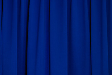 Vibrant Royal Blue Velvet Theater Curtain Folds