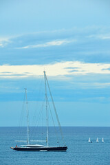Four small sailboats