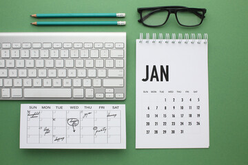 Desktop calendar on a modern desktop. Schedule and time planning in office and business.