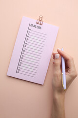 To-do list in a notepad on your desk in the office. Organising time
