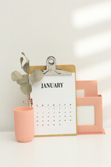 Desktop calendar on a modern desktop. Schedule and time planning in office and business.