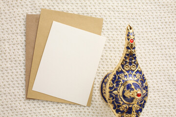 Book Quran Ramadan. Lantern for the Muslim holy month of Ramadan Karim. Decorative holiday lamp, Islamic prayer mat for namaz. Symbol of fasting sawm, white card, picture for your text