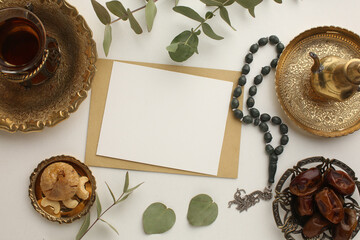 Book Quran Ramadan. Lantern for the Muslim holy month of Ramadan Karim. Decorative holiday lamp, Islamic prayer mat for namaz. Symbol of fasting sawm, white card, picture for your text