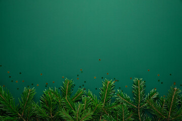 Christmas frame with xmas tree on green background. Merry Christmas greeting card. Winter holiday...