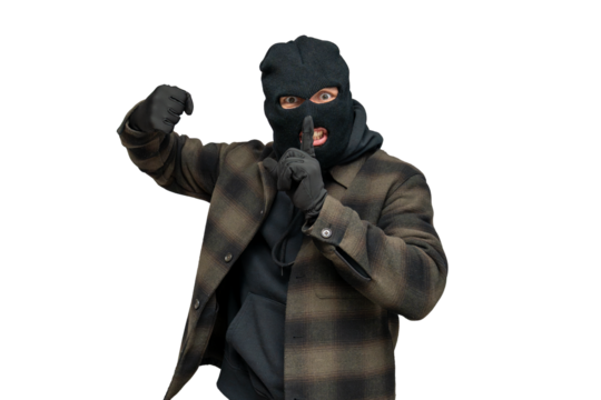 Burglar with balaclava shushing, signaling silence and secrecy during robbery, isolated white background