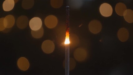 Close Up Sparkler Burning Out Bright Sparks Falling Dolly Zoom Bokeh