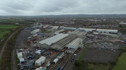 Aerial drone view of industrial warehouses, data centres and distribution factories in Loughborough, UK - Powered by Adobe