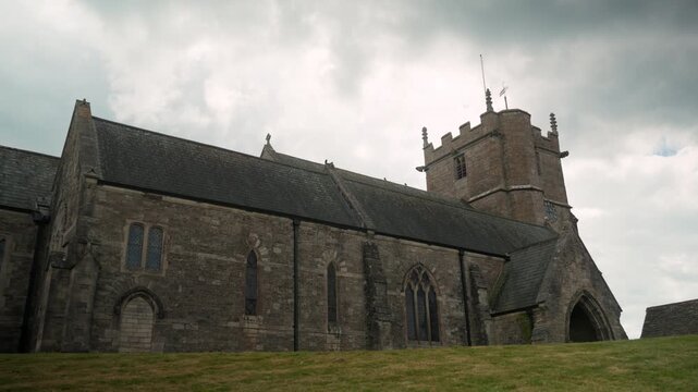 dark sacred structure, old church with foreboding aura, haunted church with threatening sky overhead