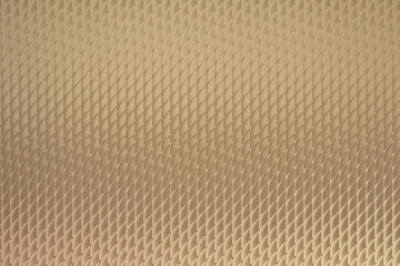 Fototapeta premium A closeup, textured background with a repeating diamond pattern in a warm, goldenbrown hue, creating a sense of luxury and depth