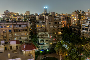 Obraz premium Residential apartment buildings at night in Cairo city, Egypt