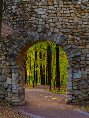 arch of an ancient tower with brick walls