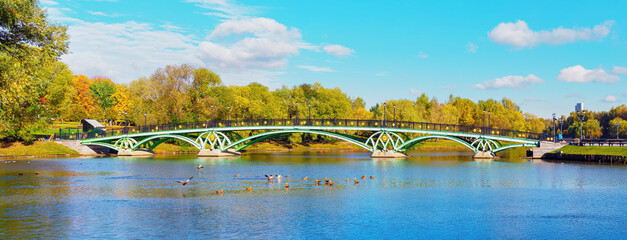 The Western Arched Bridge at the Tsaritsyno Museum-Reserve, Moscow, in autumn on a sunny day - panorama.