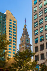Historic Daniels and Fisher Tower amid contemporary buildings in downtown Denver, Colorado
