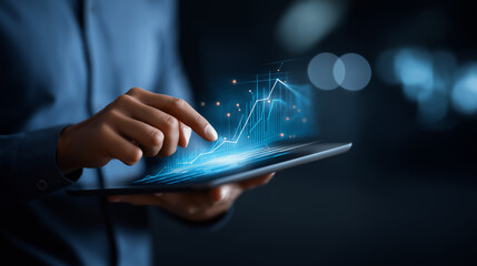Faceless businessman using tablet analyzing sales data and economic growth graph chart technology icon customer global network connection business strategy innovative digital