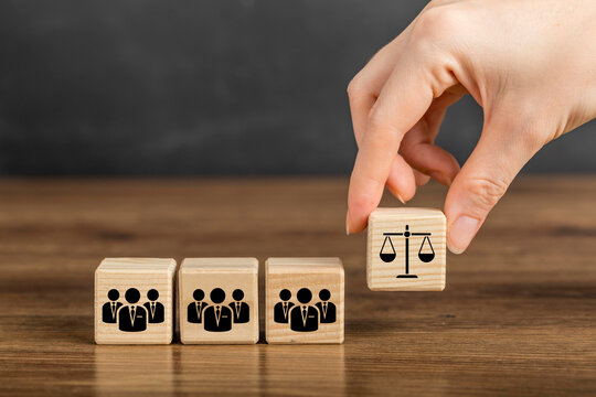 Compliance with employment laws and regulations, labor laws concept. Laws aim to protect workers from discrimination, harassment, unsafe working. Business ethics.