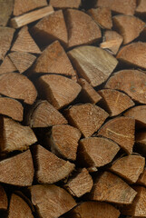 Fototapeta premium Stacked Firewood Texture Background