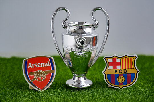 April 18, 2025, Moscow, Russia. The emblems of the football clubs participating in the UEFA Champions League Arsenal F.C. London and FC Barcelona.
