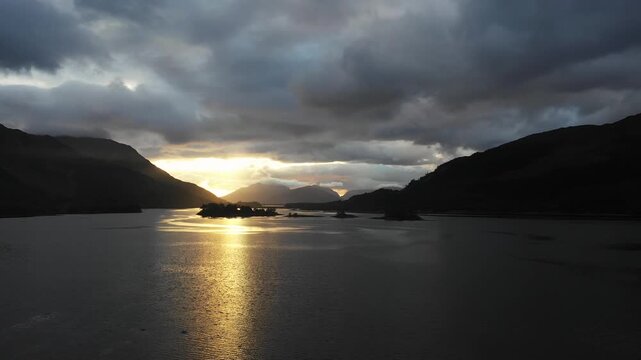 Aerial drone view of Loch Leven in Scotland at sunset