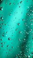 oil drops on water on blue background