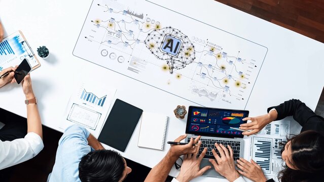 A dynamic business meeting showcasing teamwork and technology, with a focus on artificial intelligence and data analysis in a contemporary office setting. Raster