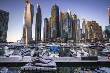 Dubai Marina, showcasing its impressive skyline with modern skyscrapers, luxury yachts, and the vibrant waterfront. Perfect for travel, architecture, and lifestyle projects.
