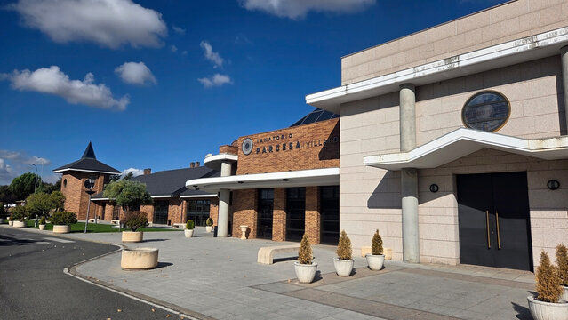 MADRD, SPAIN - OCTOBER, 11, 2025. Crematorium in Collado Villalba, Madrid, Spain. Modern crematorium architecture against blue sky