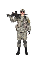 A soldier holds a rifle on his shoulder